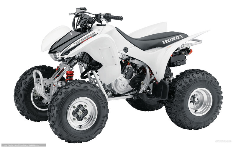 White Honda four-wheeler ATV