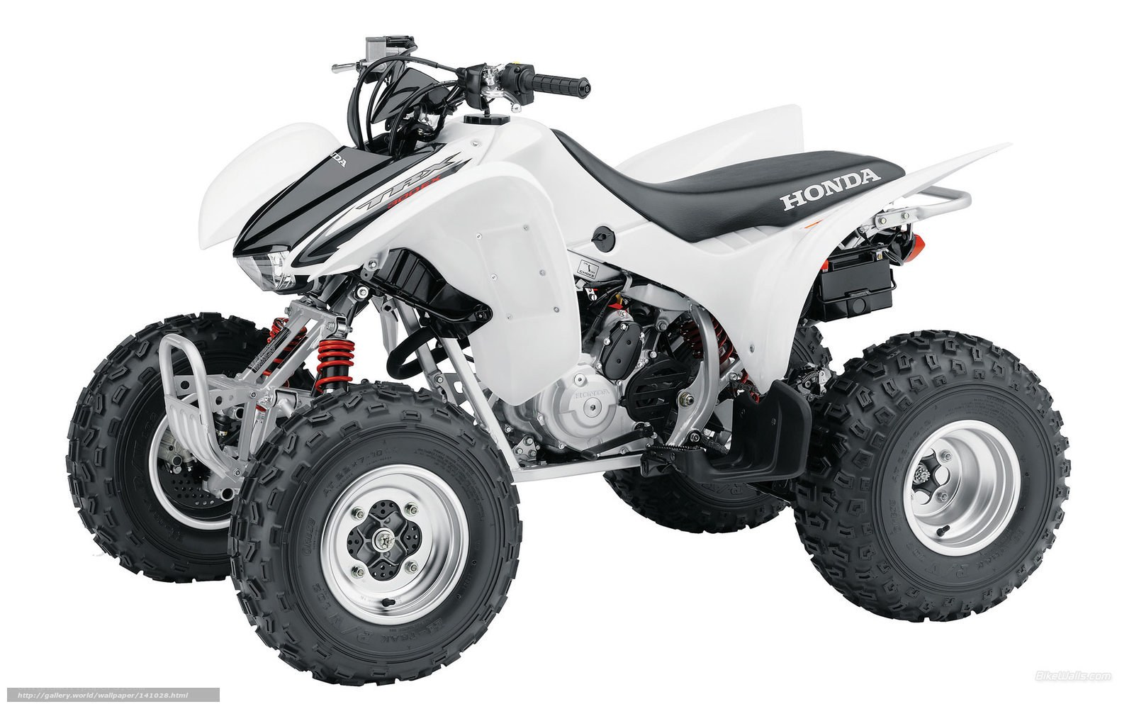 White Honda four-wheeler ATV