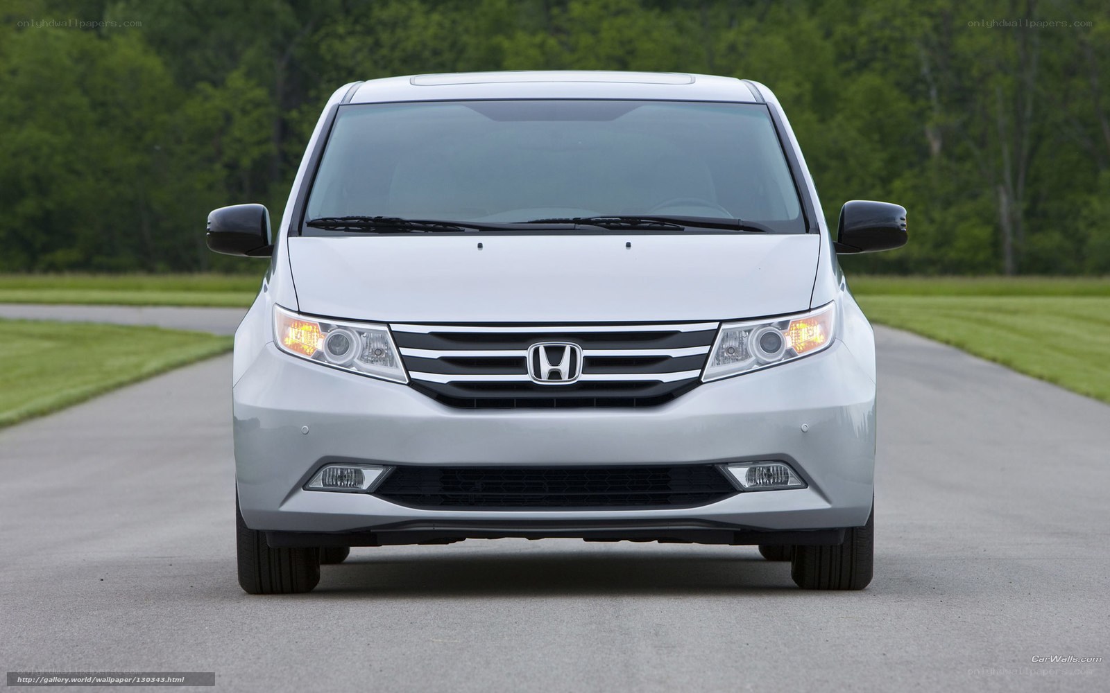 white honda minivan on road