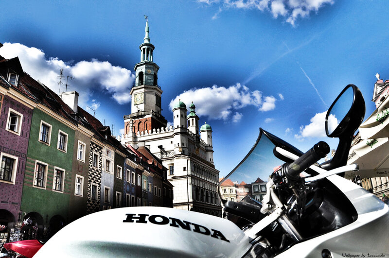 White Honda Motorcycle — Blue