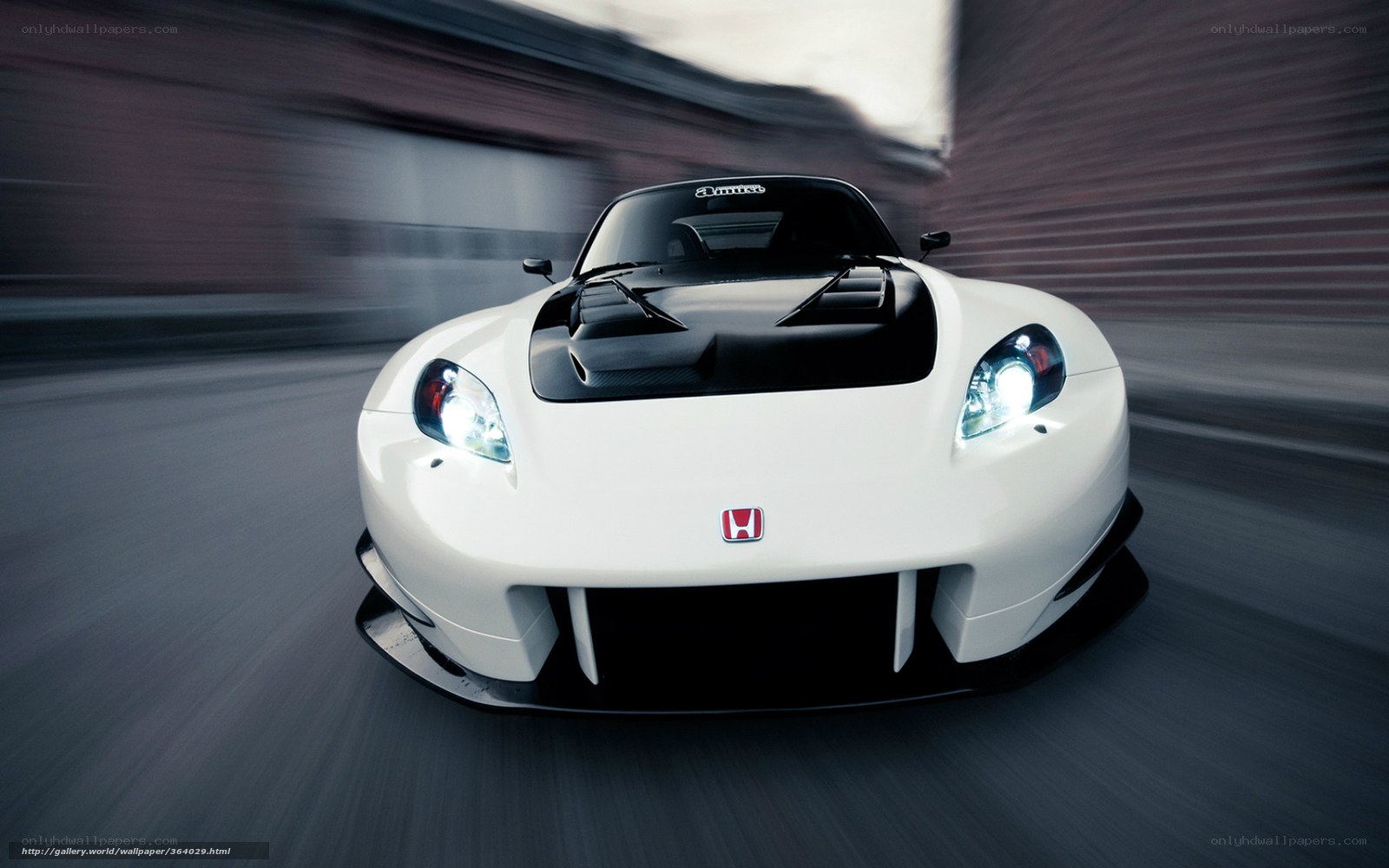 white honda race car in motion