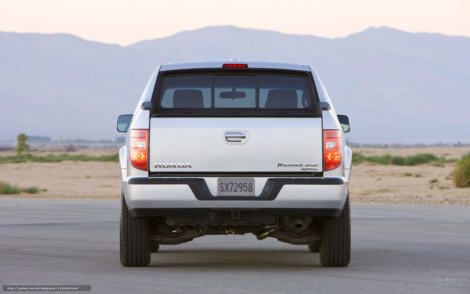 white honda ridgeline pickup truck