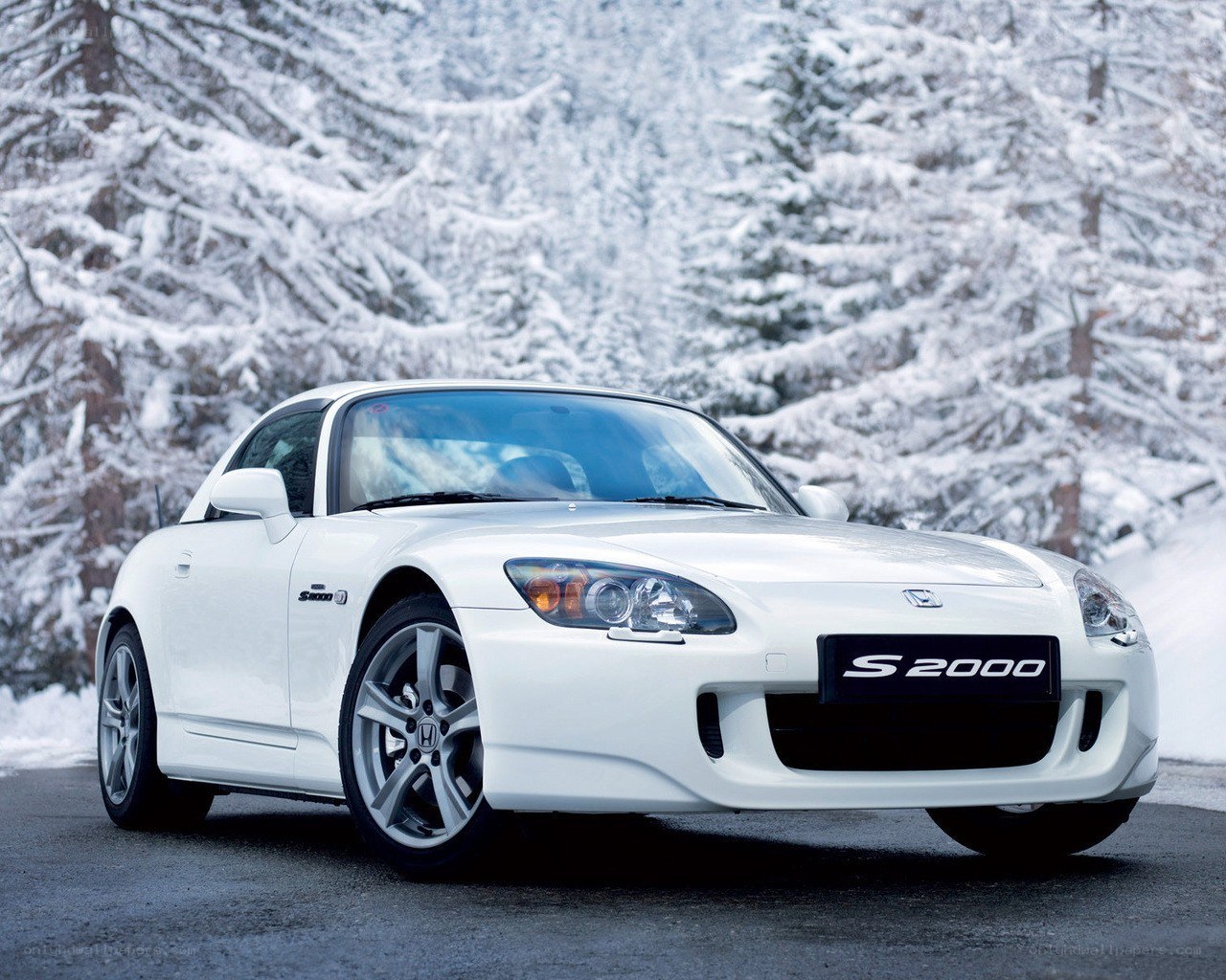 White Honda S2000 in snow