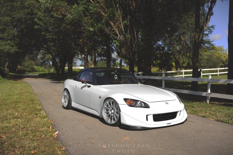 White Honda S2000 on a country road