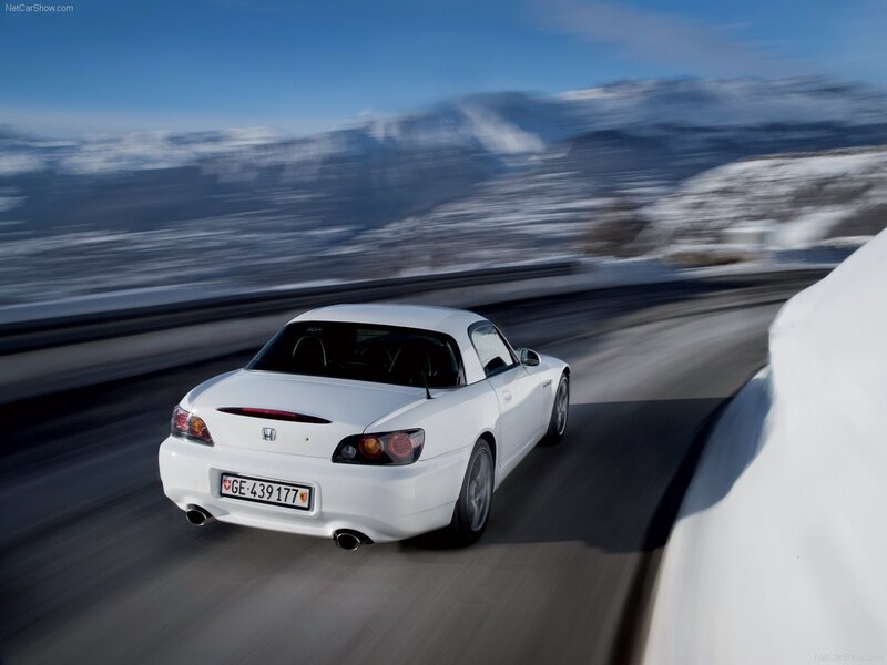White Honda S2000 on snowy road
