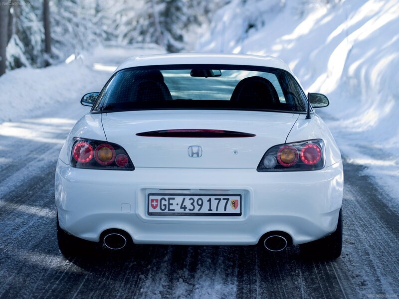 White Honda S2000 on snowy road