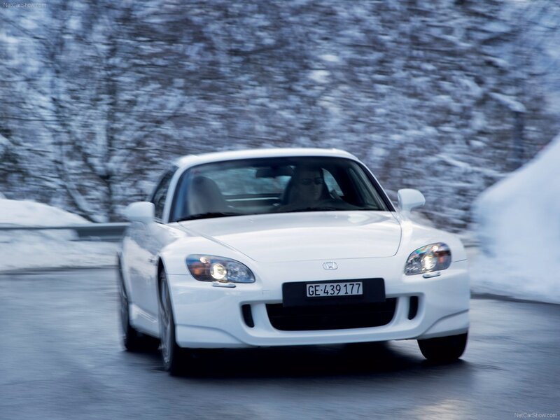 White Honda S2000 on snowy road