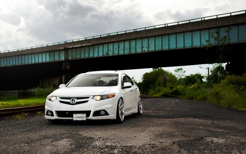 white honda under a bridge