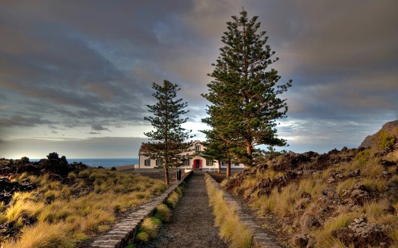 White House on Volcanic Coast — Gray
