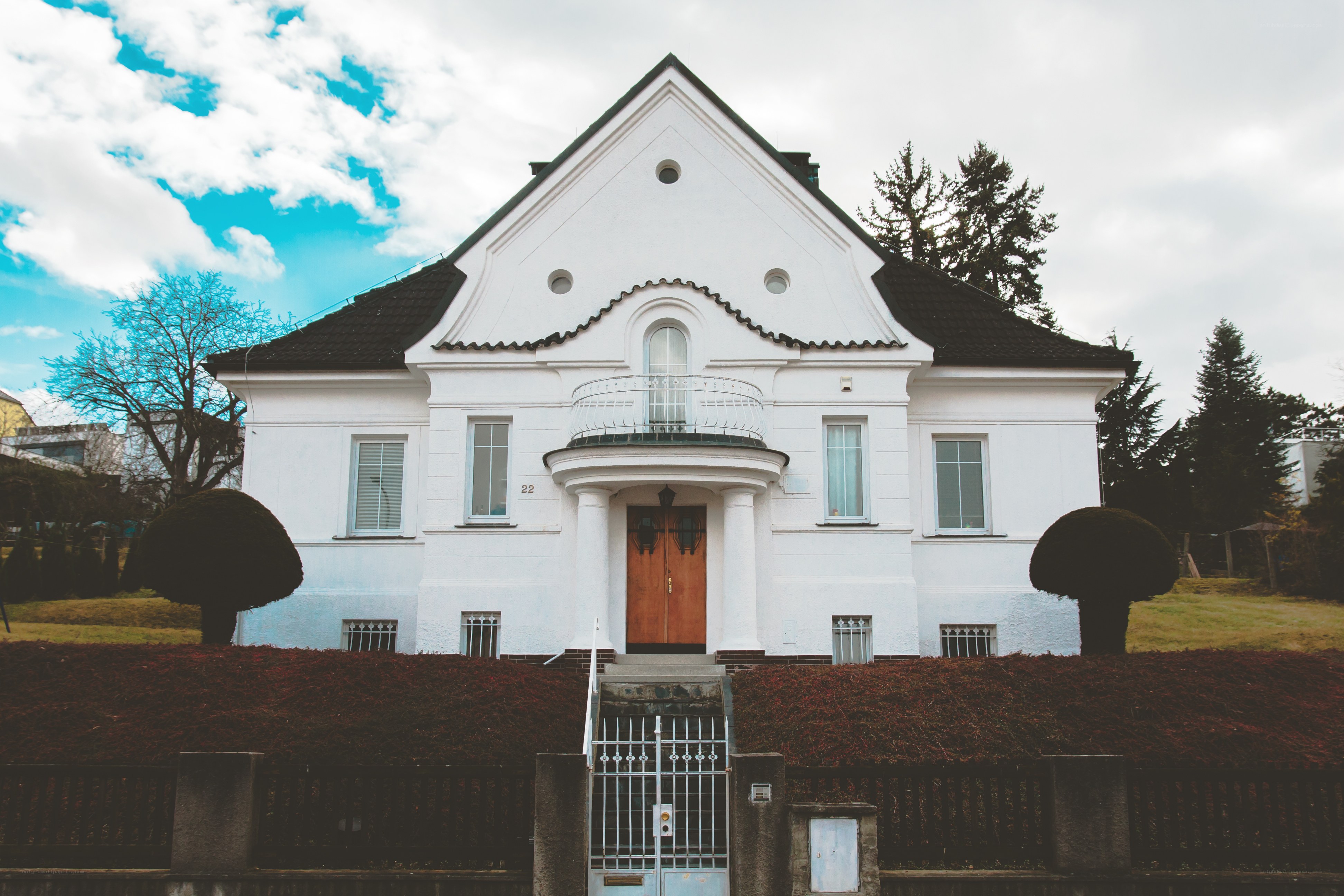 white house with balcony