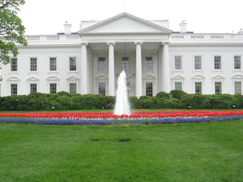White House with flower beds