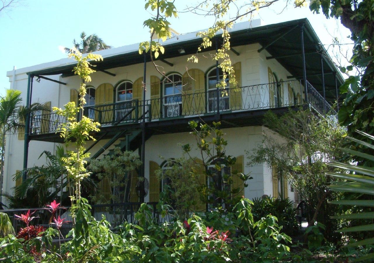 white house with green shutters