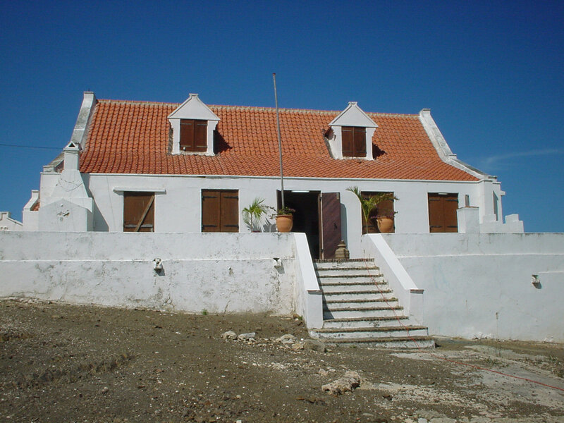 white house with red roof