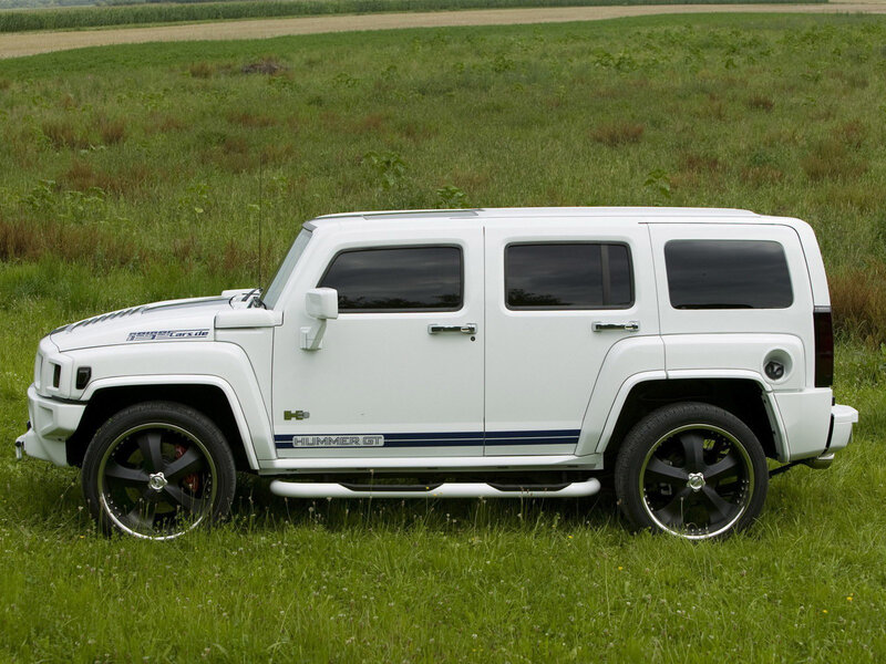 White Hummer GT in a field