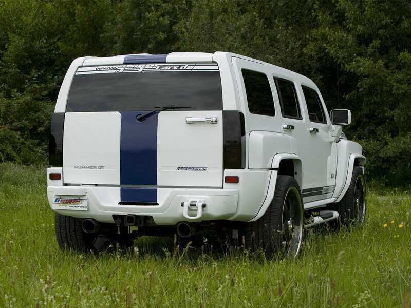 white hummer gt in grass