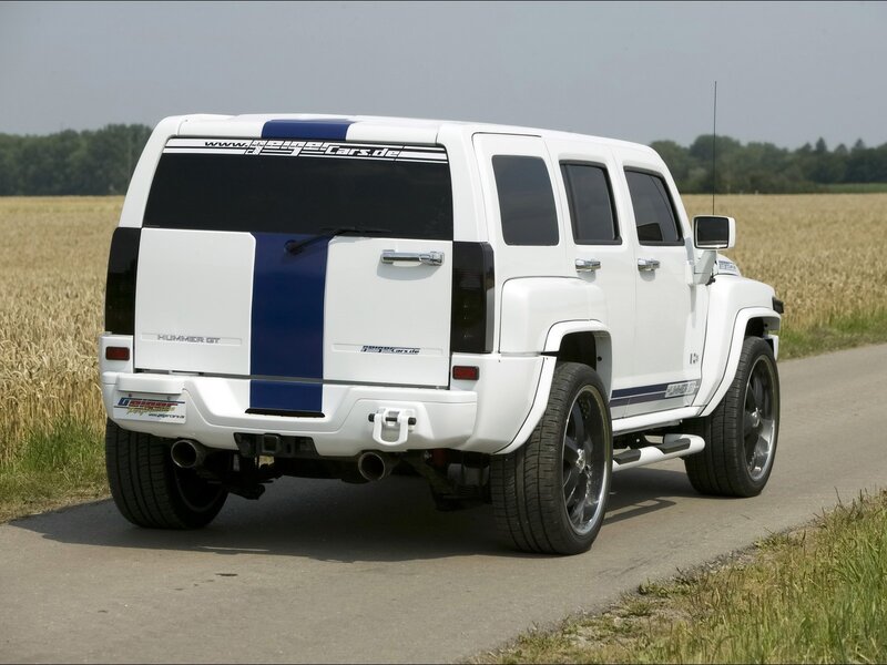 white hummer gt on country road