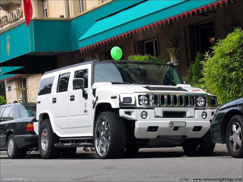 White Hummer H2 parked on street
