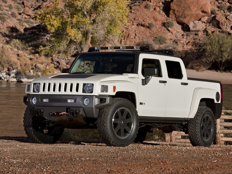 White Hummer H3T pickup truck