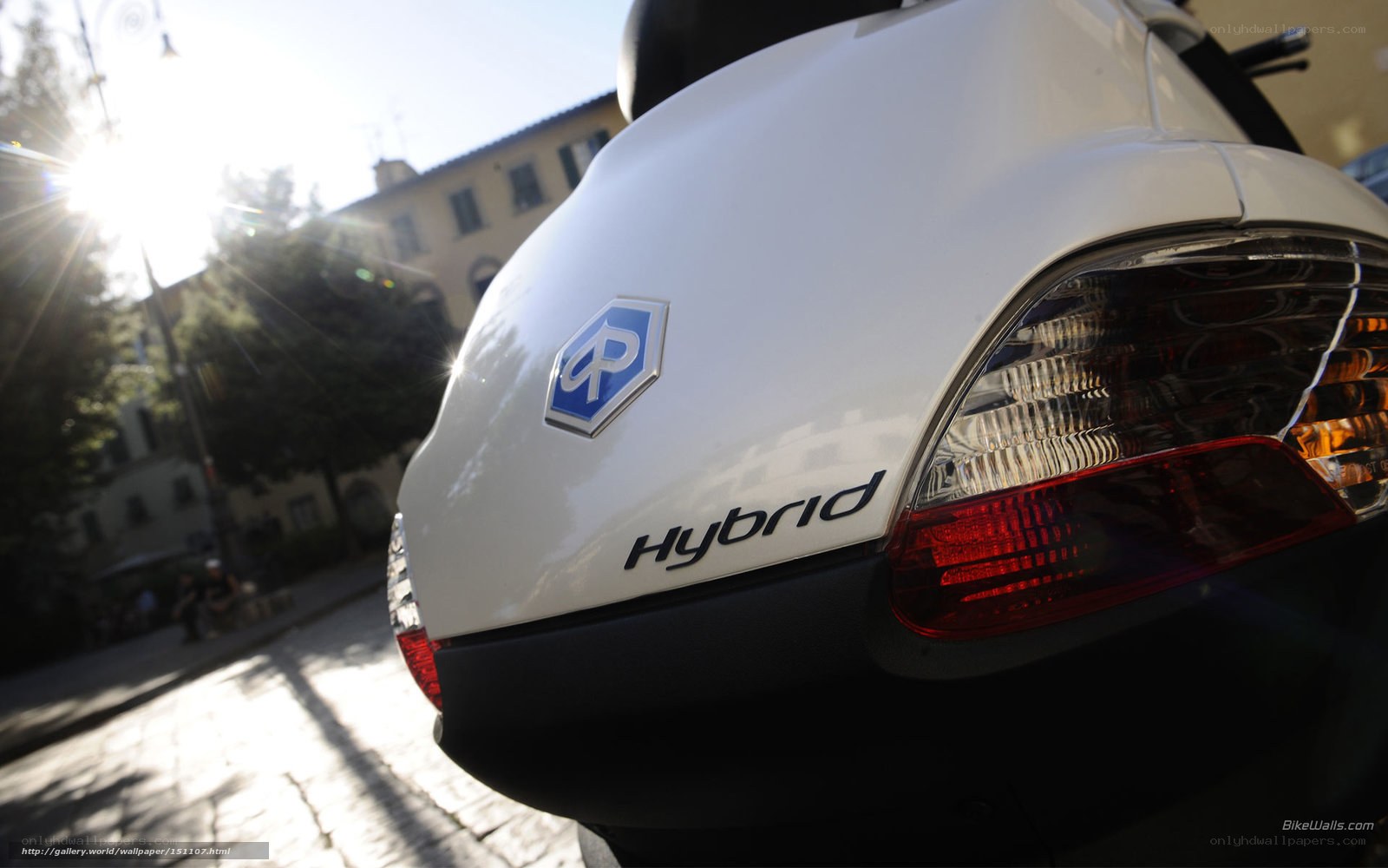 White hybrid scooter rear view