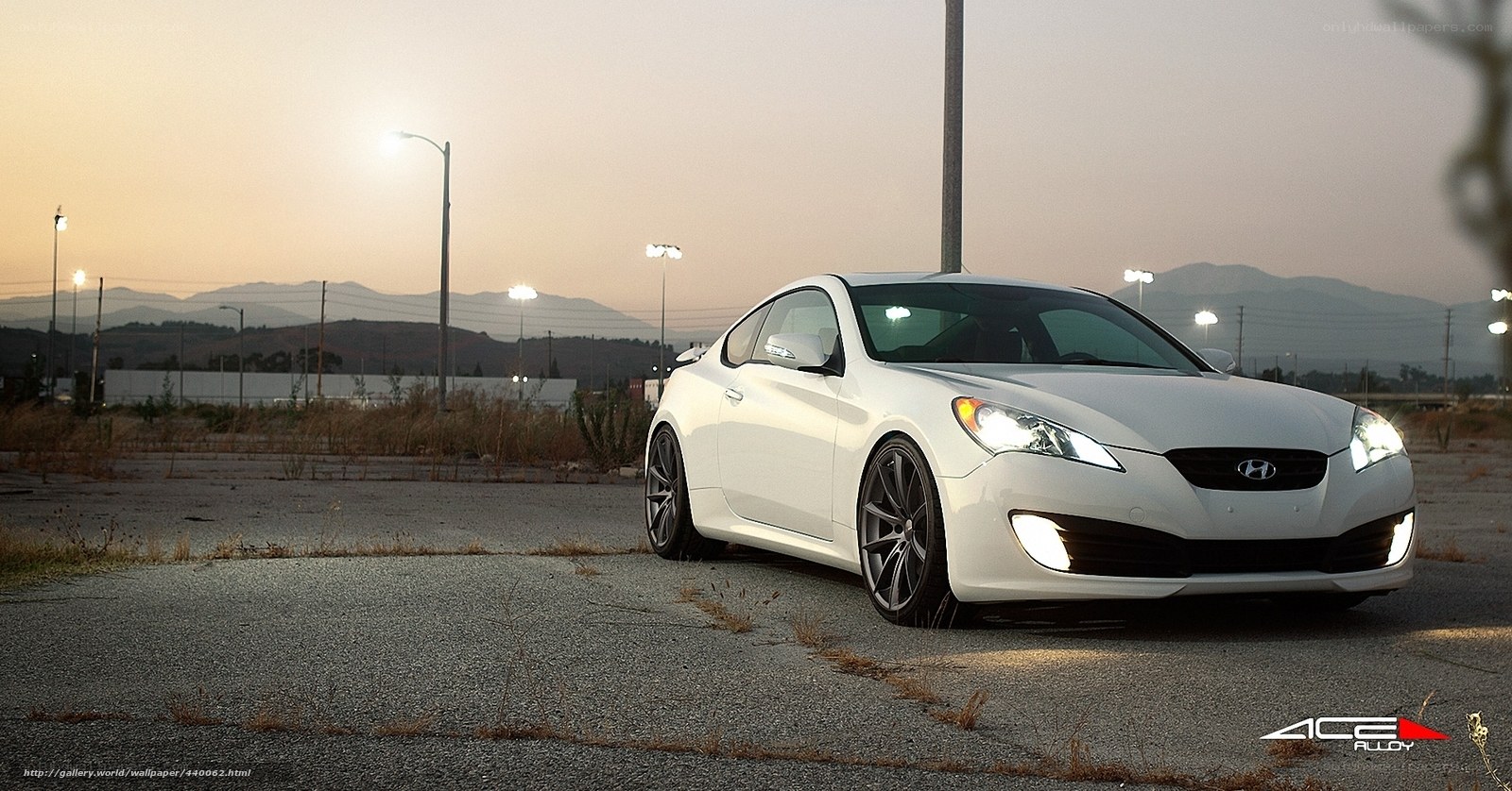 White Hyundai Coupe at dusk