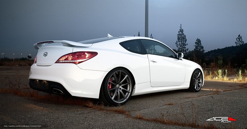 white hyundai coupe on asphalt