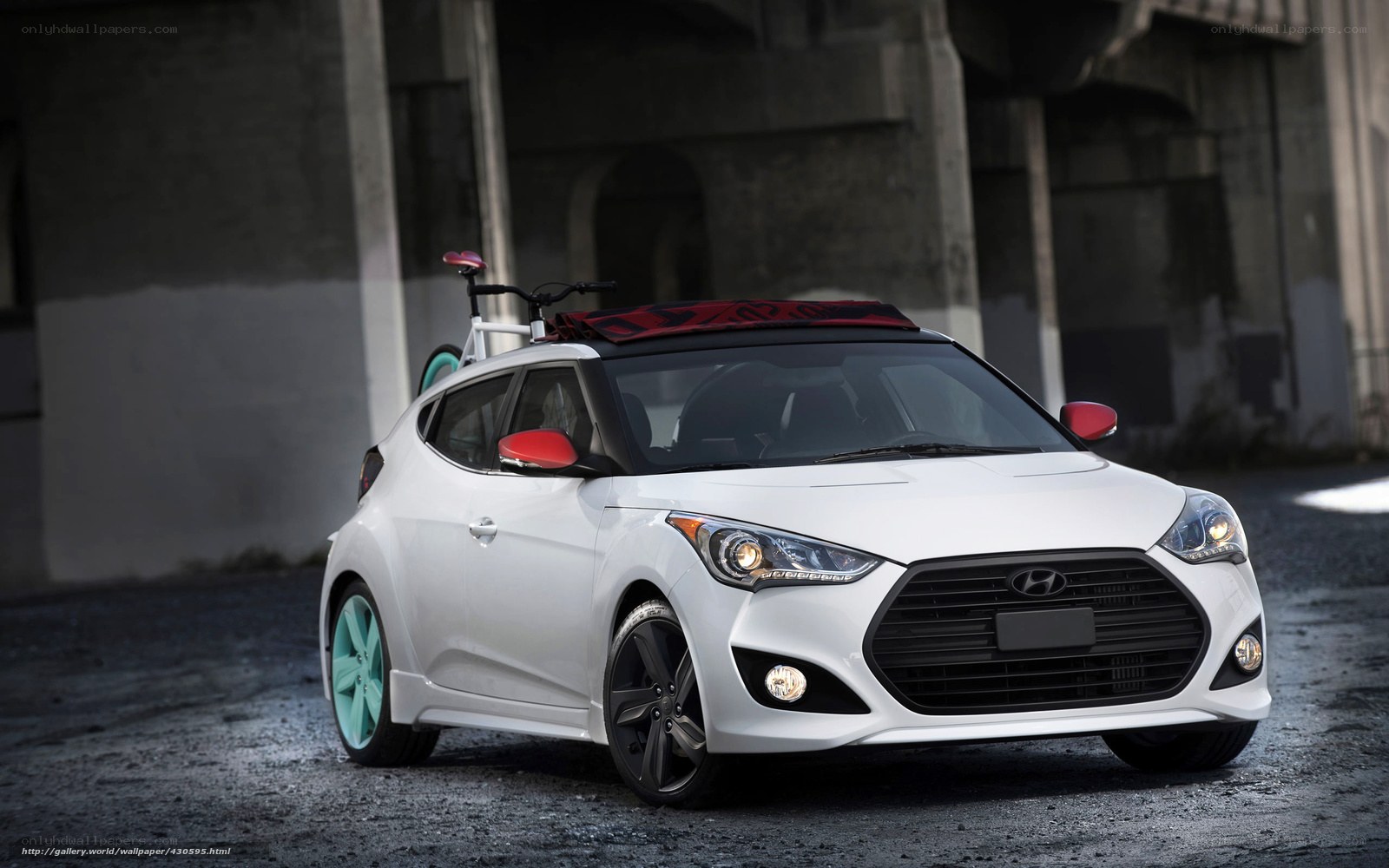 White Hyundai Veloster with bike rack