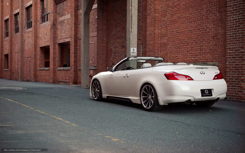 white infiniti convertible in alley