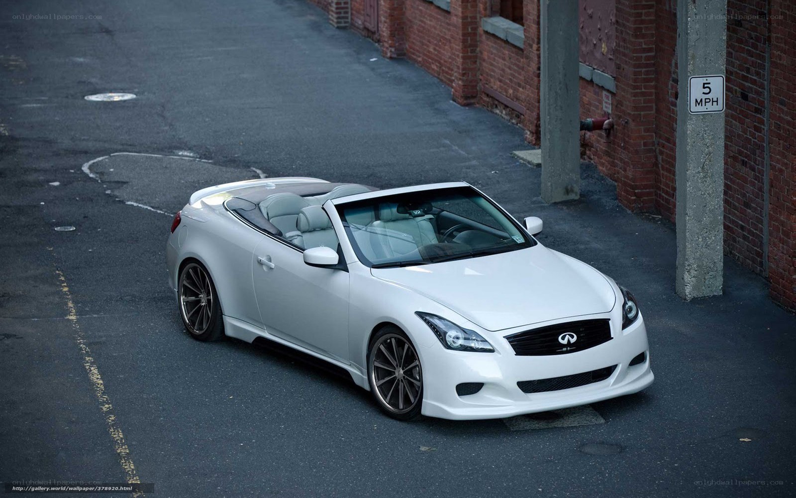 white infiniti convertible on street