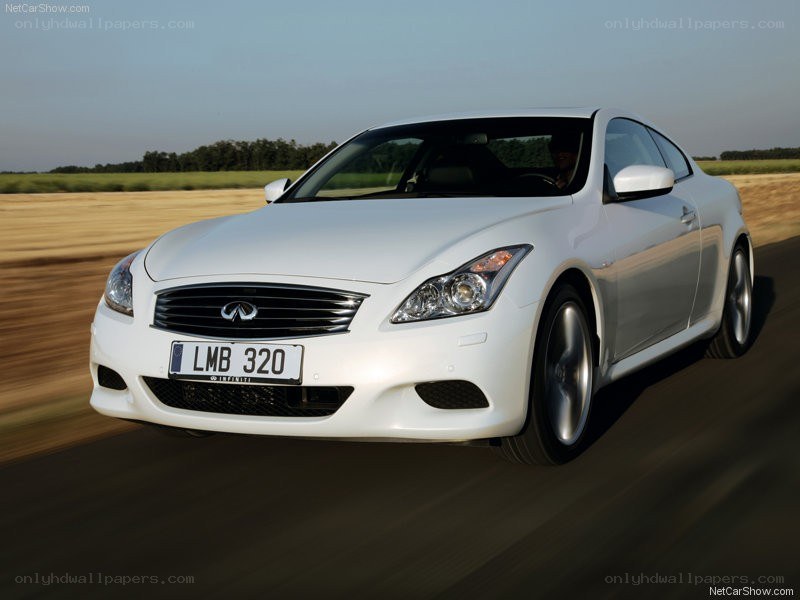 white infiniti coupe in motion