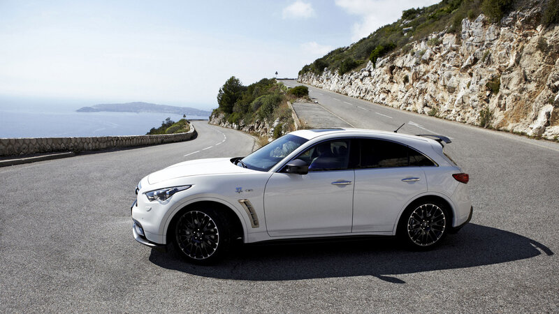 White Infiniti QX50 on coastal road