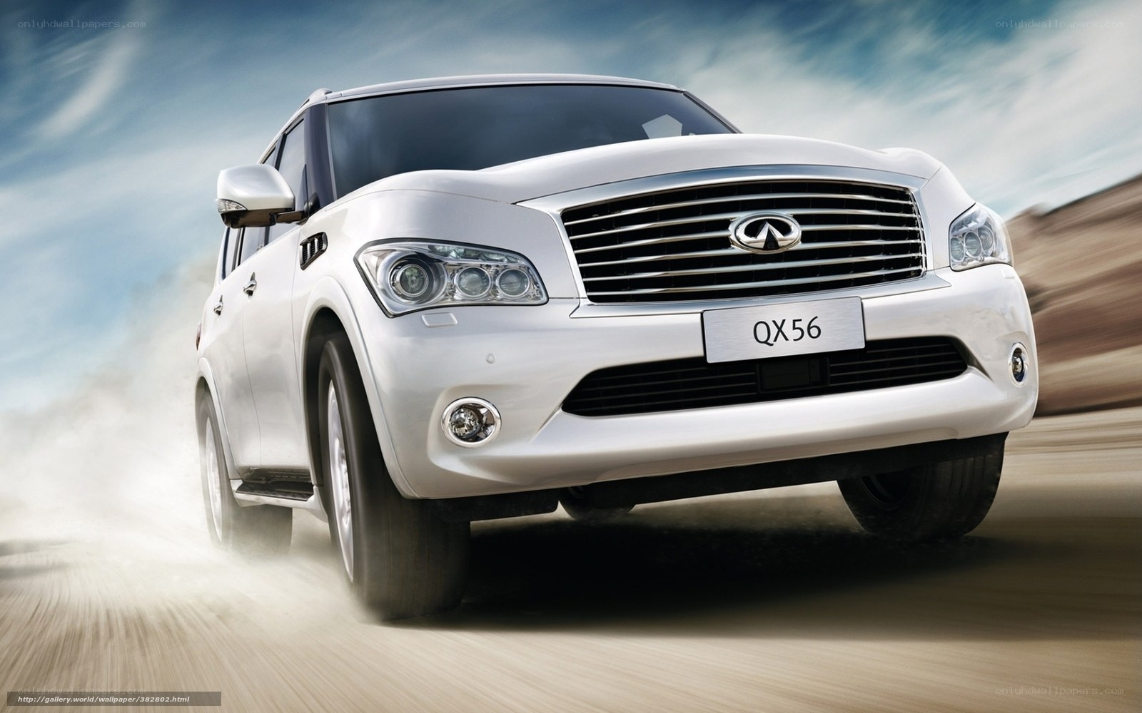 White Infiniti QX56 in motion