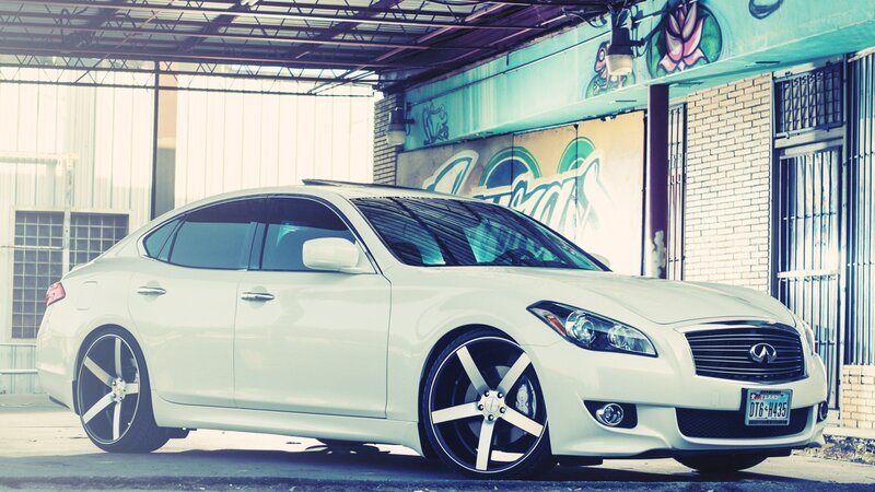 White Infiniti Sedan — Urban, Afternoon