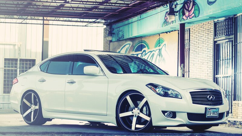 White Infiniti Sedan — Urban