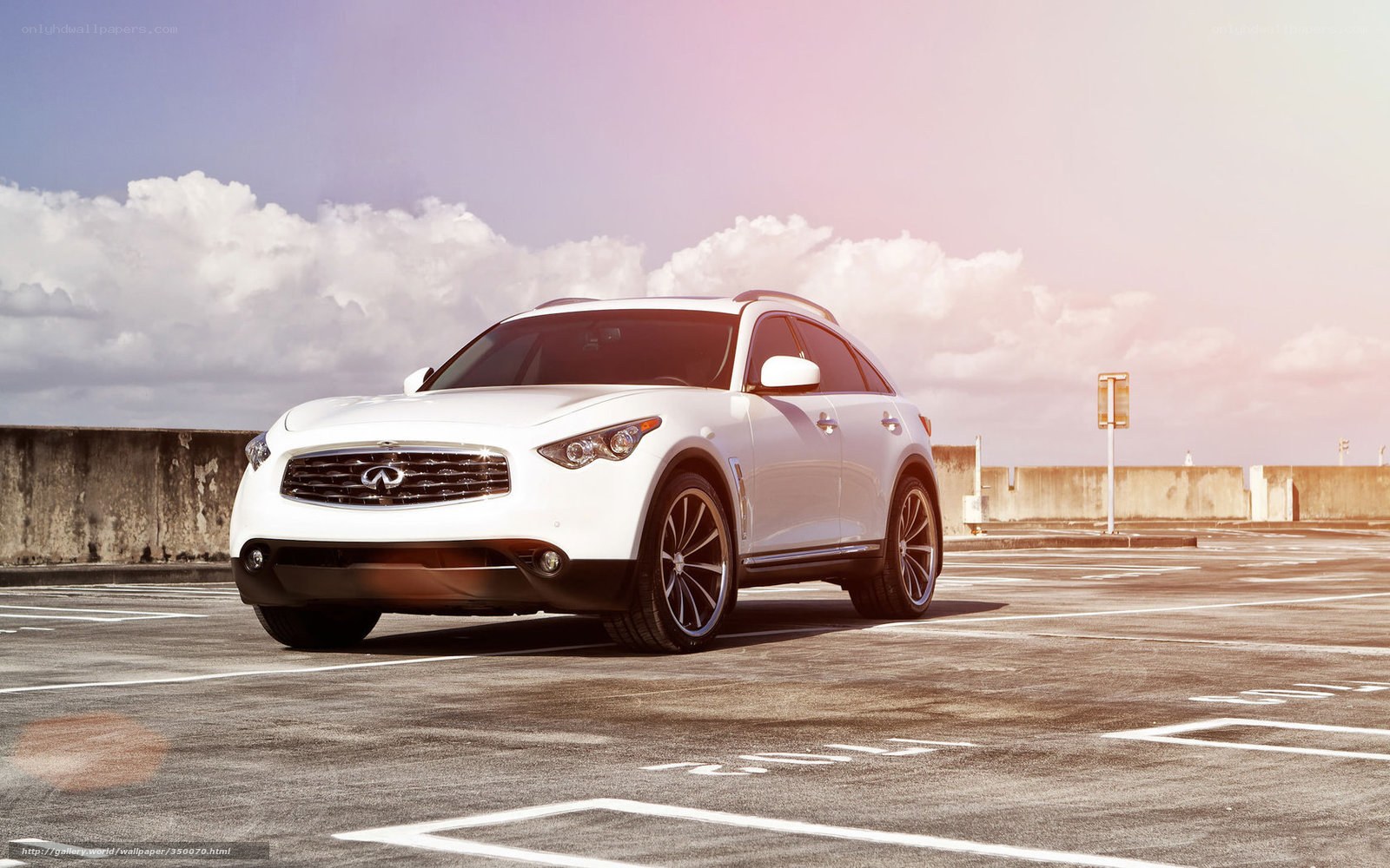 White Infiniti SUV on rooftop