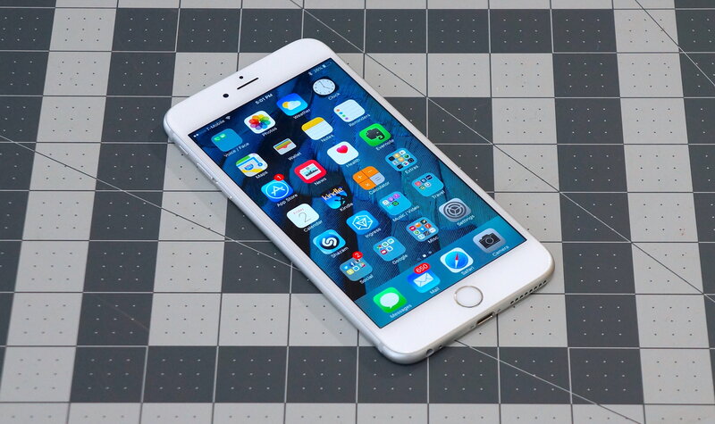 White iPhone on checkered surface