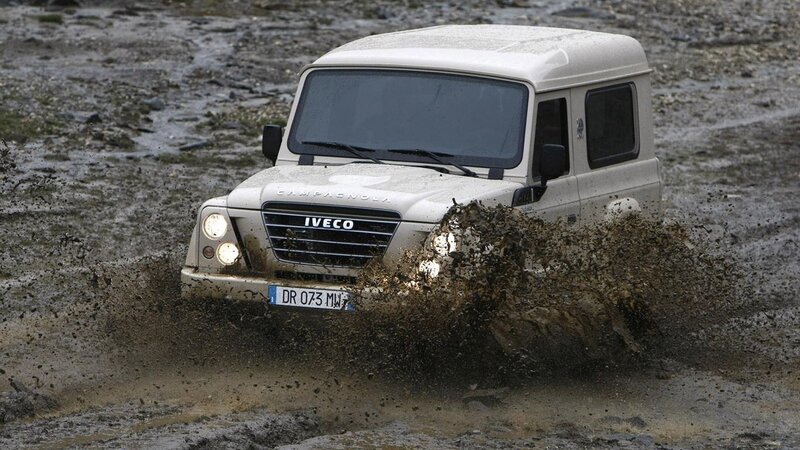 white iveco campagnola in mud
