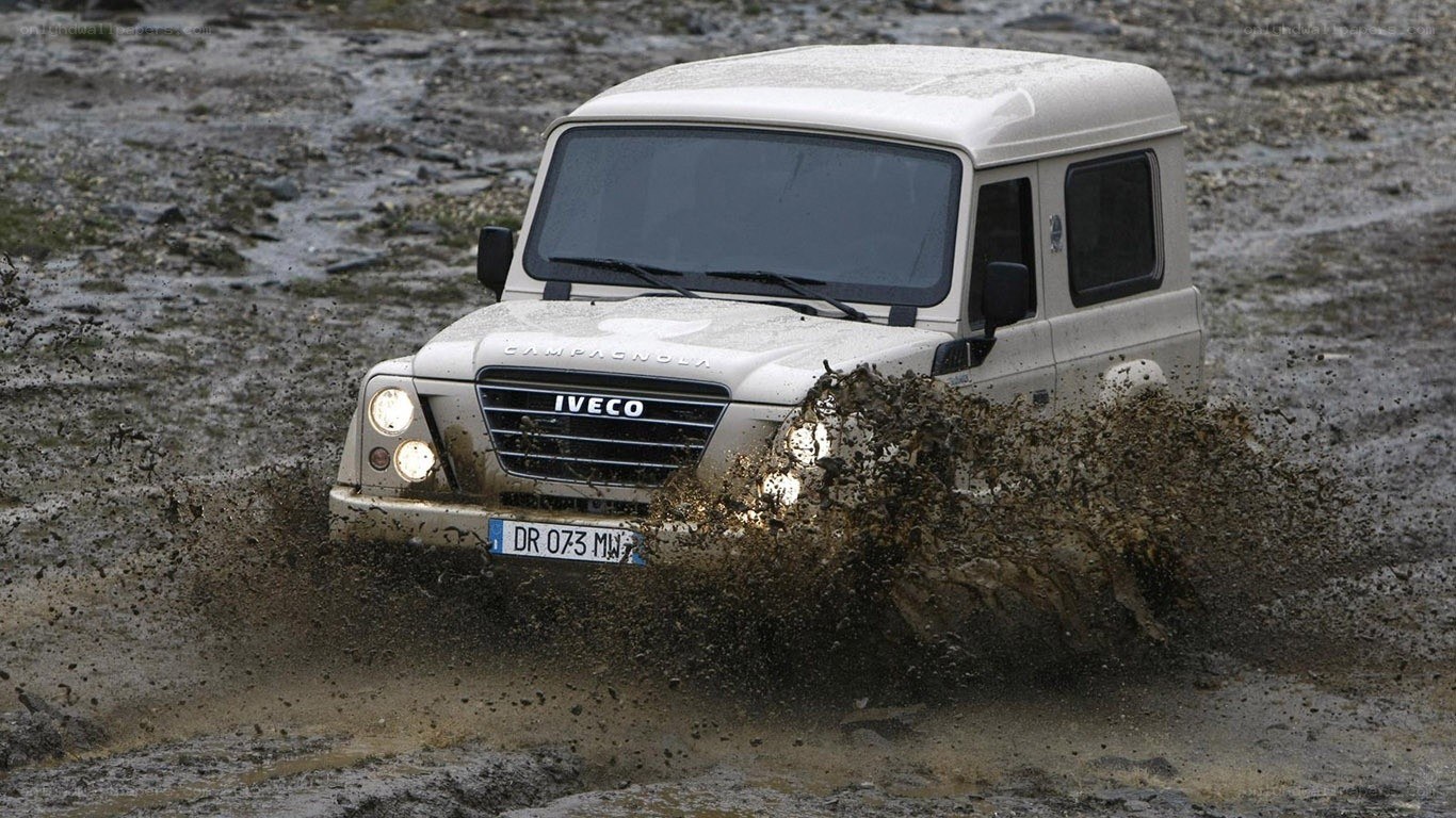 white iveco campagnola in mud