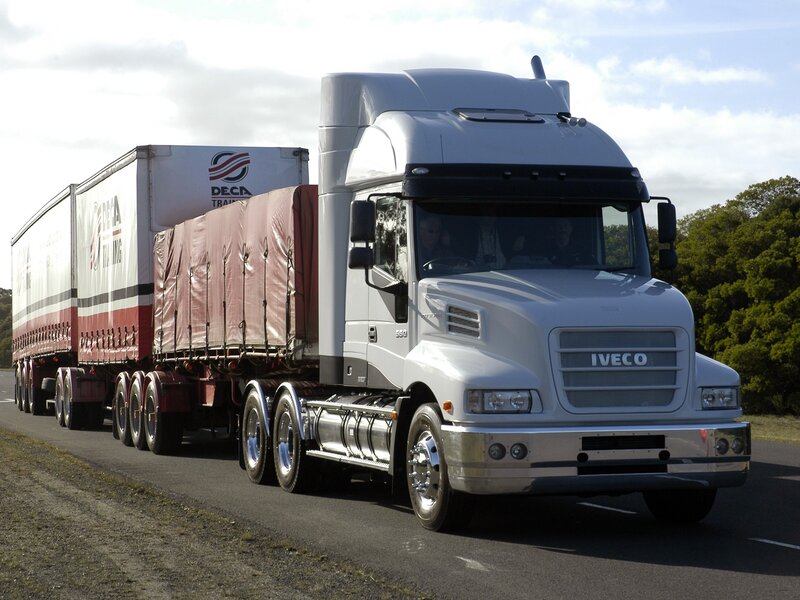 White Iveco truck on highway