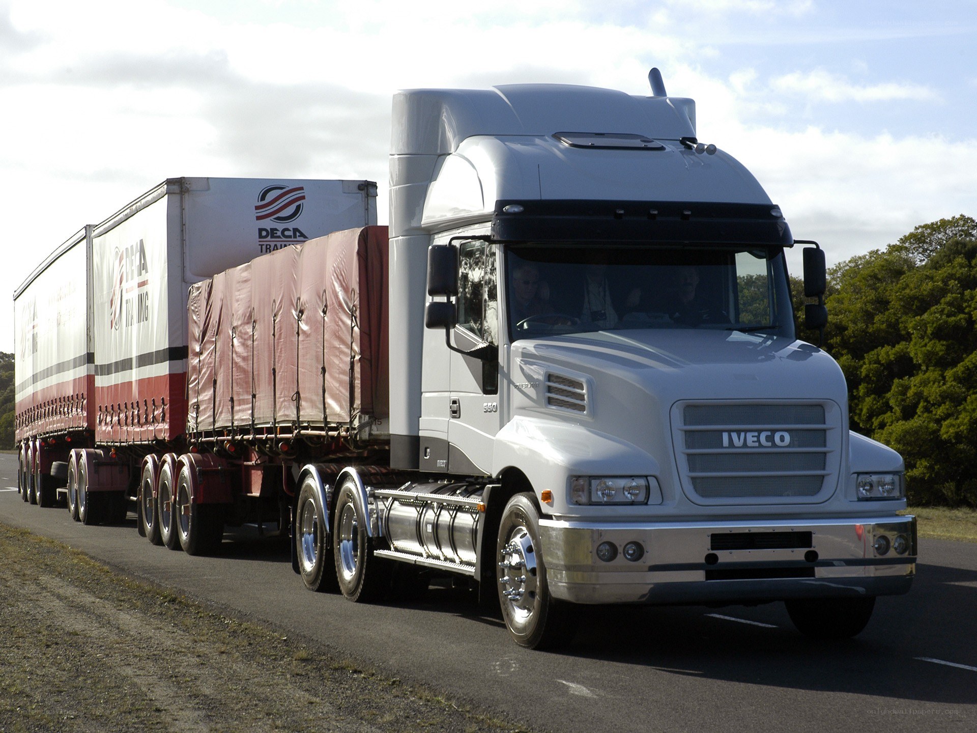 White Iveco truck on highway