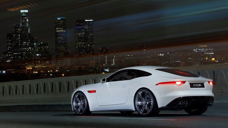 White Jaguar C-X16 on city bridge