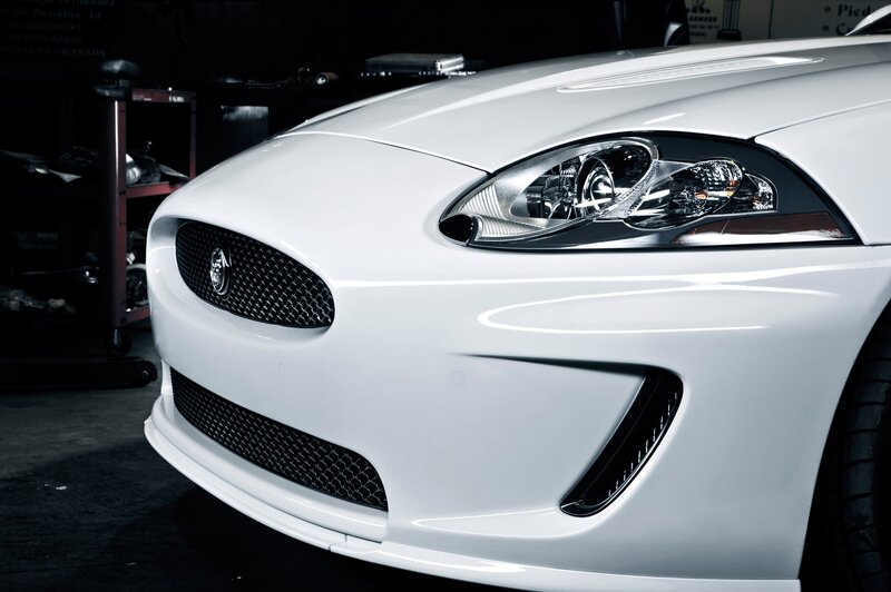 White Jaguar Car — Dramatic, Photograph, Headlight