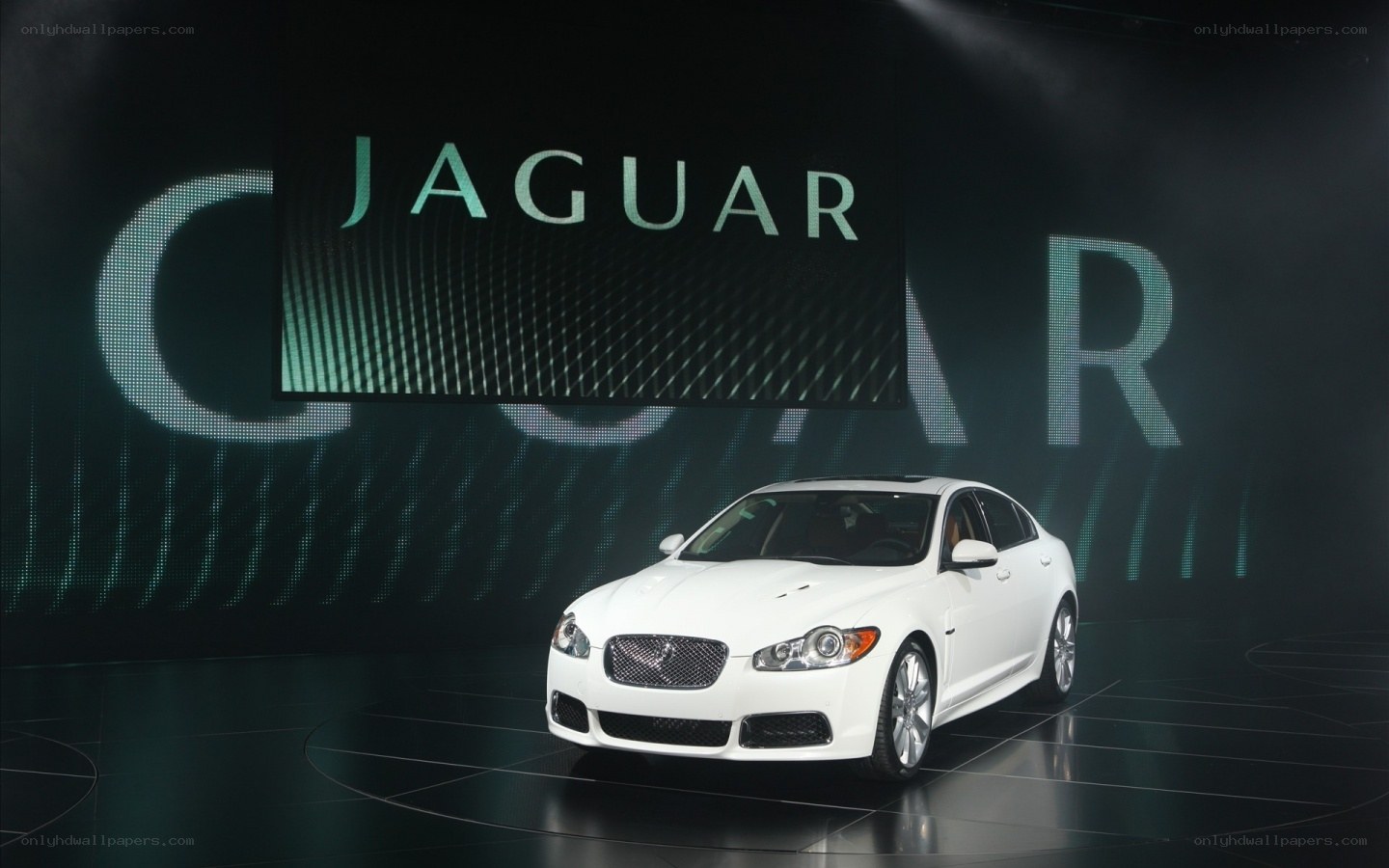 White Jaguar car on stage