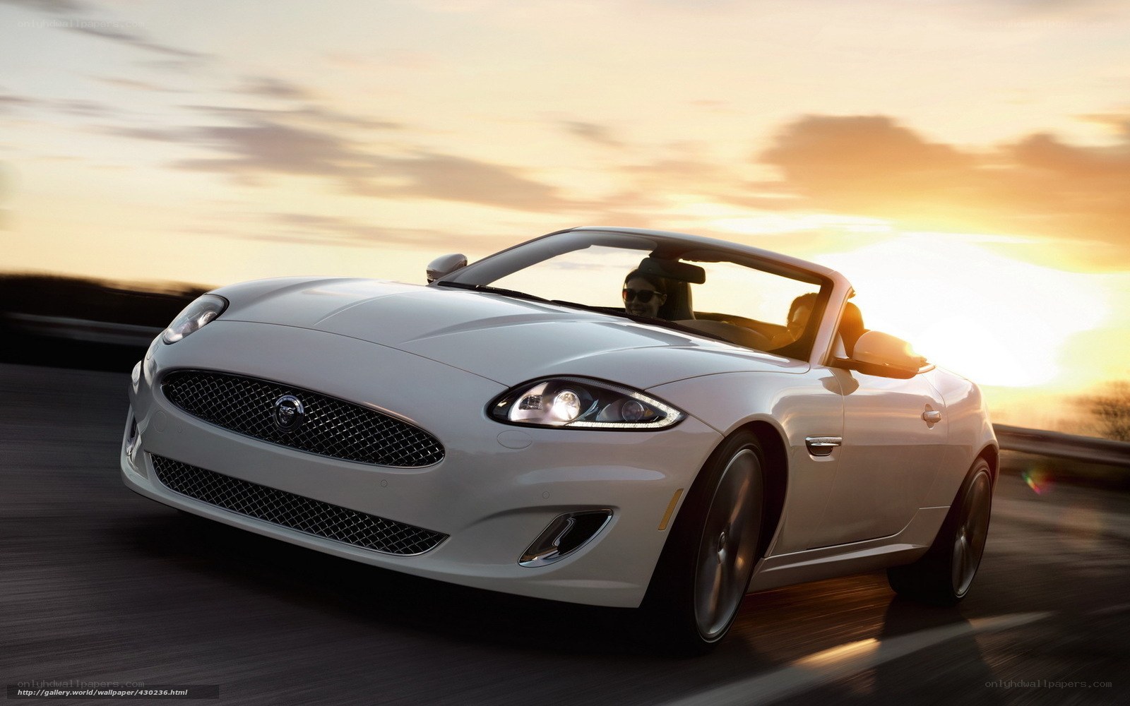White Jaguar Convertible at Sunset