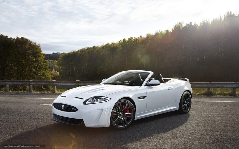 White Jaguar Convertible on Road