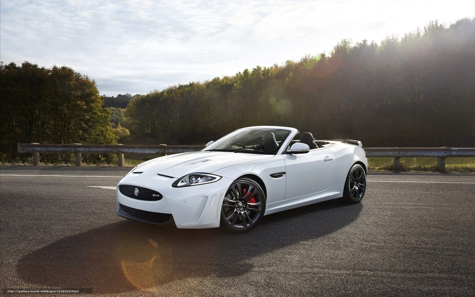 White Jaguar Convertible on Road