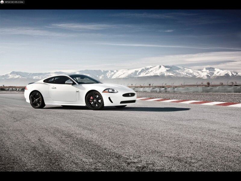 White Jaguar Coupe — Dramatic, Winter