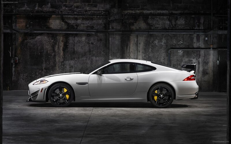 white jaguar coupe in garage