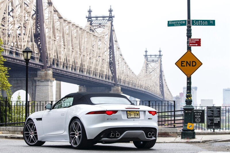 White Jaguar F-Type by a bridge