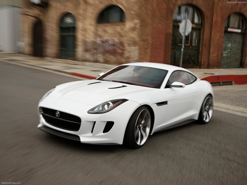 White Jaguar F-Type in motion