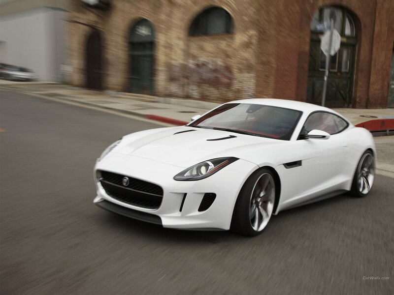 White Jaguar F-Type in motion